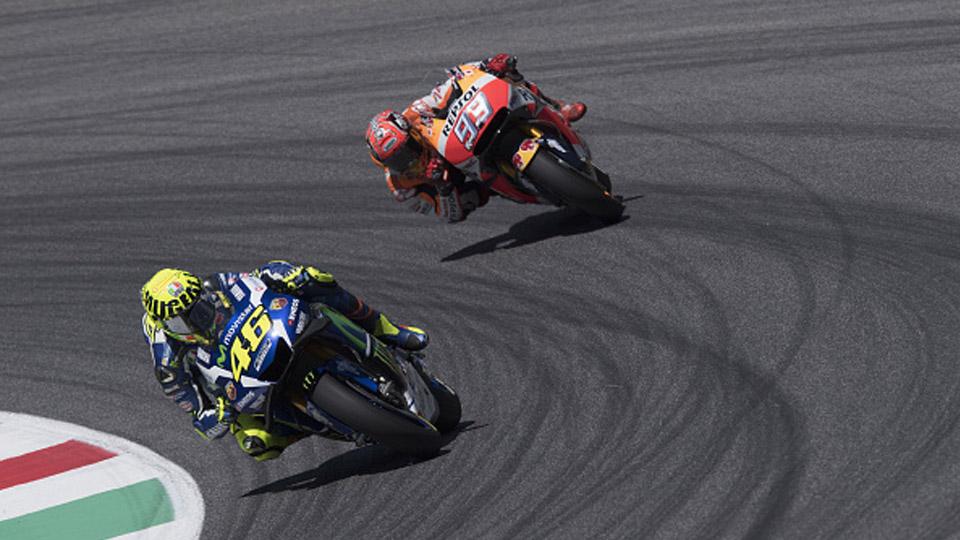 Valentino Rossi dan Marc Marquez. - INDOSPORT